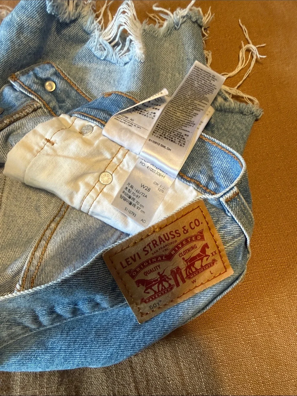 Levi 501 Light Blue Distressed Denim Shorts - Women
